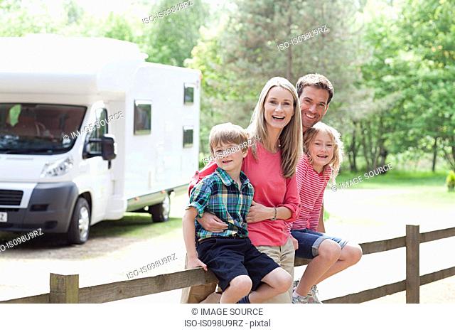 Happy family on caravan holiday