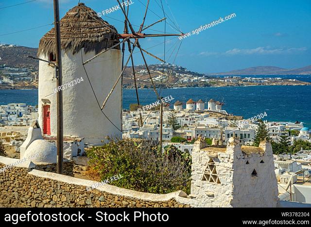 Elevated view of windmills and town, Mykonos Town, Mykonos, Cyclades Islands, Greek Islands, Aegean Sea, Greece, Europe