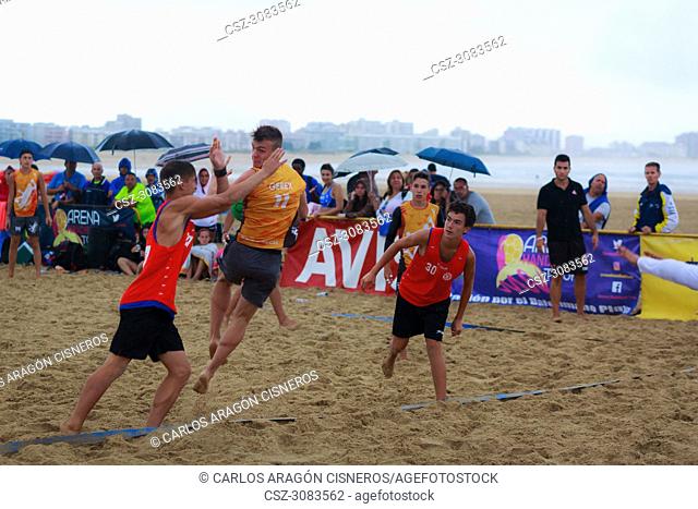 LAREDO, SPAIN - JULY 30: Unidentified player launches to goal in the Spain handball Championship celebrated in the beach of Laredo in July 30, 2016 in Laredo