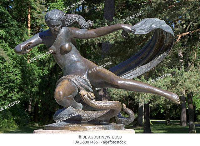 The statue of Egle, Queen of Serpents, from Baltic mythology, in the garden of Tyszkiewicz palace (1893-1897), Palanga, Klaipeda County, Lithuania