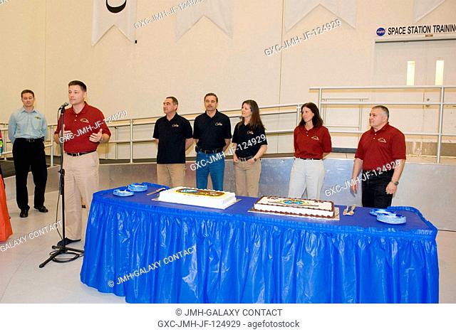 NASA astronaut Doug Wheelock, Expedition 24 flight engineer and Expedition 25 commander, speaks to a crowd during a cake-cutting ceremony in the Jake Garn...