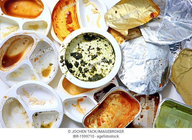 Used packaging, remains of prepared meals, convenience food, plastic and aluminum trash