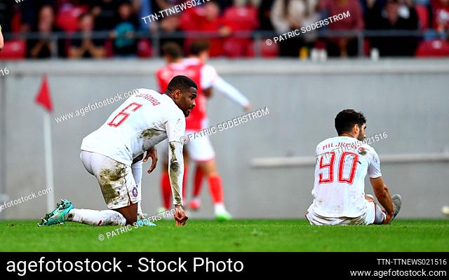 Pyunik's Juninho (L) and Aleksandar Miljkovic react after Kalmar scored the opening goal during the UEFA Europa Conference League