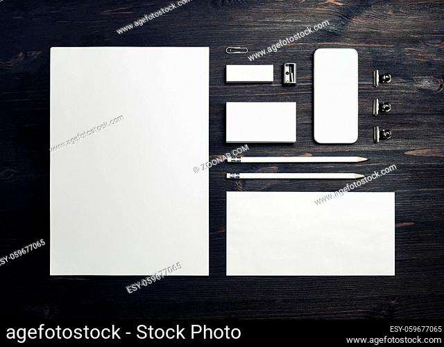 Blank business stationery set. Corporate identity template on wooden background. Flat lay