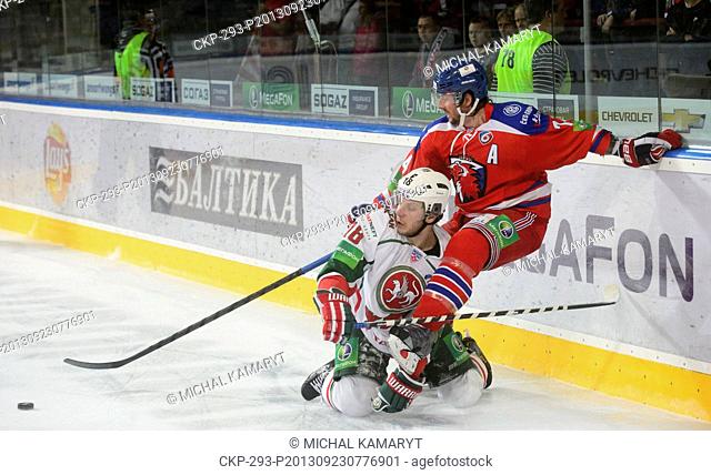 Michail Varnakov of Kazan, left, and Nathan Oystrick of Lev Praha are seen during the KHL match HC Lev Praha vs AK BARS Kazan in Prague, Czech Republic