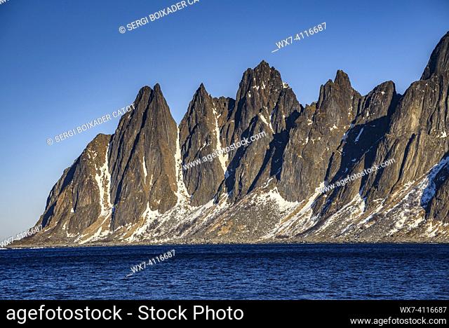 Oksen Mountain (also known as the ""Devil's Teeth""), on a cold sunny winter morning (Senja, Norway)