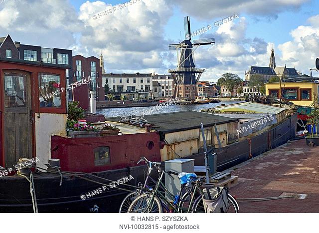 Adriaan windmill with houseboat in Haarlem, North Holland, Netherlands