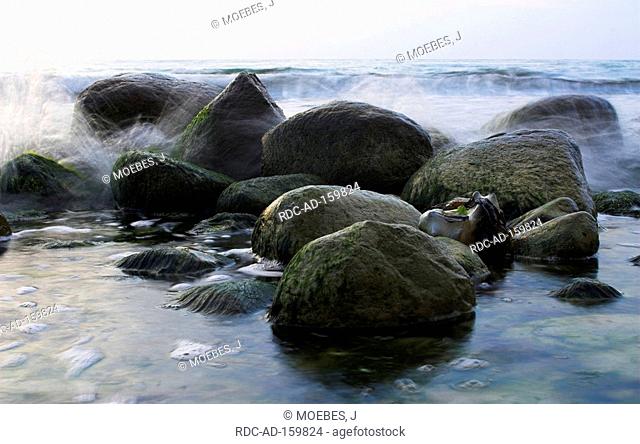 Stones in sea surf Sassnitz Isle of Rugen national park Jasmund Mecklenburg-Western Pomerania Germany Rügen