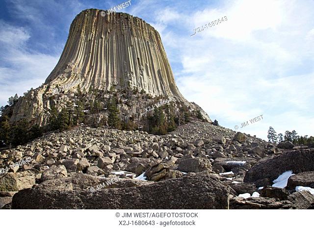 Hulett, Wyoming - Devils Tower National Monument  The volanic tower rises 1200 feet above the surrounding plains  A boulder field with fallen rock and columns...