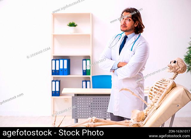 Crazy doctor examining the dead patient