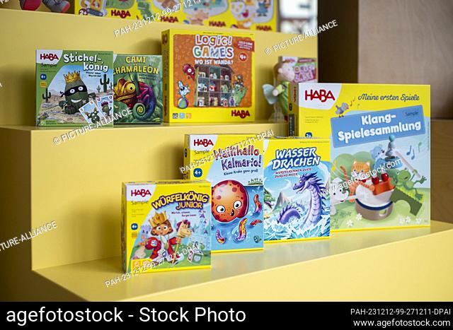 12 December 2023, Bavaria, Bad Rodach: Various HABA games are on display in the HABA Group showroom. The ailing toy and furniture manufacturer is to cut around...
