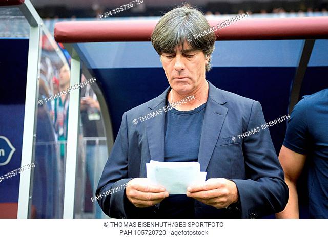 coach Joachim Loew (Germany) reads a note. GES / Football / World Cup 2018 Russia: Germany - Mexico, 17.06.2018 GES / Soccer / Football / Worldcup 2018 Russia:...