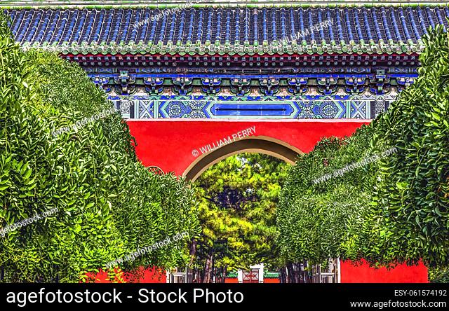 Red Ornate Gate Temple of Sun City Park Beijing China Green Trees Built 1530 in Ming Dynasty