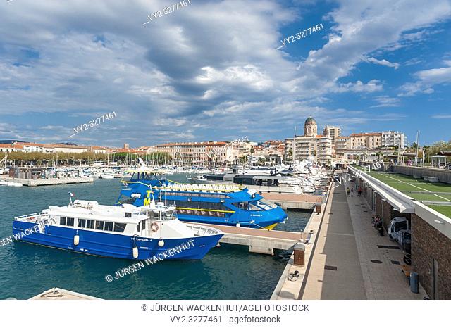 Harbor with city view, in the background the Basilica Notre Dame of Victoire, Saint-Raphael, Var, Provence-Alpes-Cote d`Azur, France, Europe