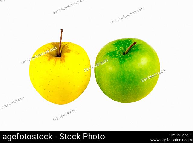 Two juicy apple yellow green stand light lanch on a white background isolated close-up