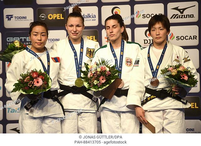 L-R: Sumiya Dorjsuren (Mongolia), Theresa Stoll (Germany), Jovana Rogic (Serbia) and Nae Udaka (Japan) celebrate after competing in the -57 kilo category at the...