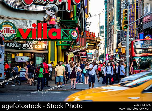 New York City / USA - JUL 13 2018: Times Square street view at rush hour in midtown Manhattan