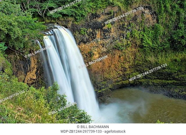 Kauai Hawaii Wailua Falls famous TV falls with water flow into lake tourist attraction