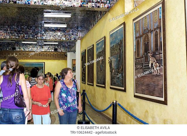 Aparecida Brazil Sao Paulo State Basilica Of The National Shrine Of Our Lady Of Aparecida People Visiting Aparecida Museum Looking At Paintings Of The Miracles...