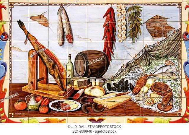 Painting on ceramic tiles of Andalusian food. Malaga, Andalusia, Spain