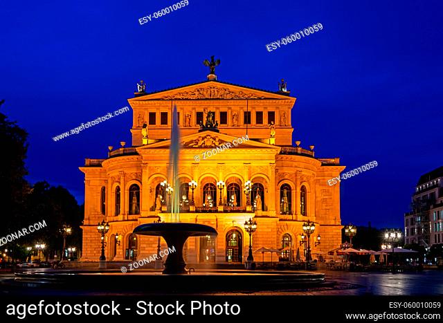 Illuminated old opera house in Frankfurt at night