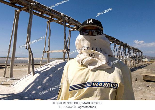 Worker in the salt works in Salinas at Bani on the south coast 70 km west of Santo Domingo, Dominican Republic