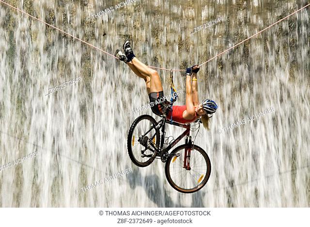 Crossing the waterfall with the bike