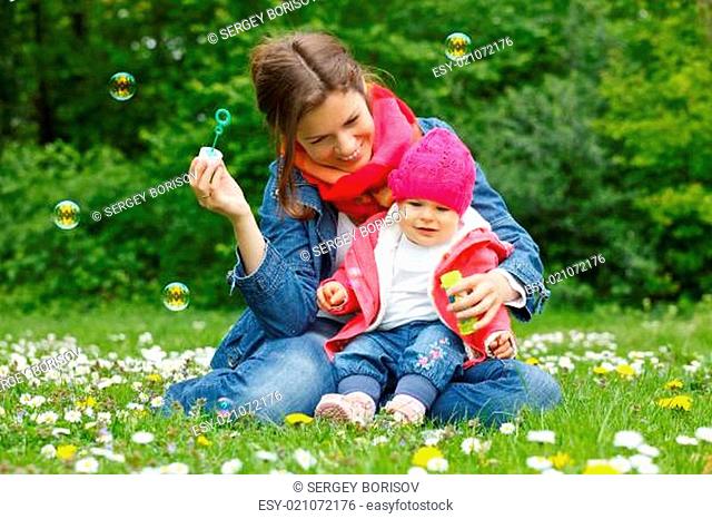 Mother with baby in the park