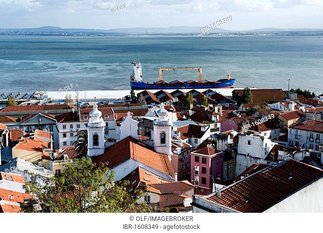 View from Miradouro Santa Luzia over the Alfama district on the Tagus river, Lisbon, Portugal, Europe