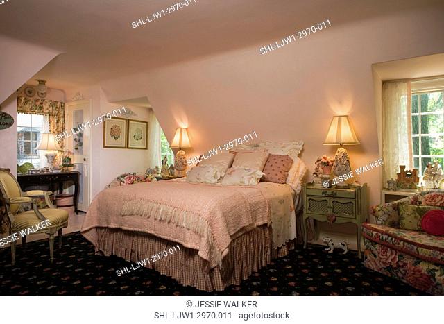 BEDROOM: Cottage style pale pink colors, flea market finds, black patterned rug, slanted walls