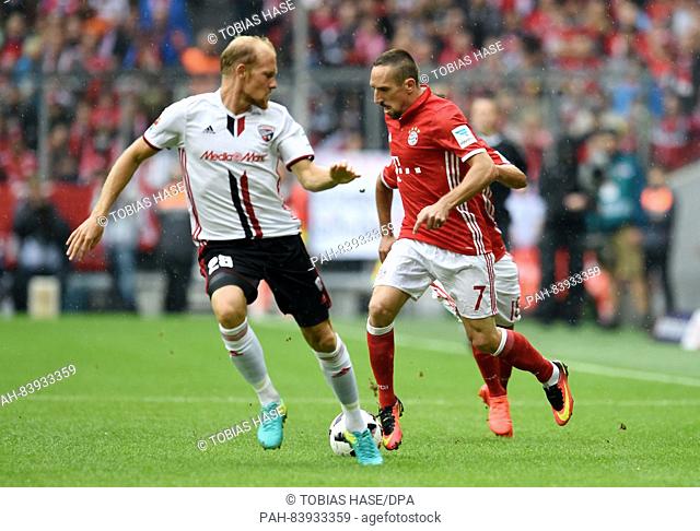 Franck Ribery (R) from Bayern and Tobias Levels from Ingolstadt vie for the ball during the German Bundesliga soccer match between Bayern Munich and FC...