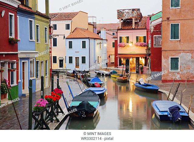 Boats in Burano Canal During a Rain Shower