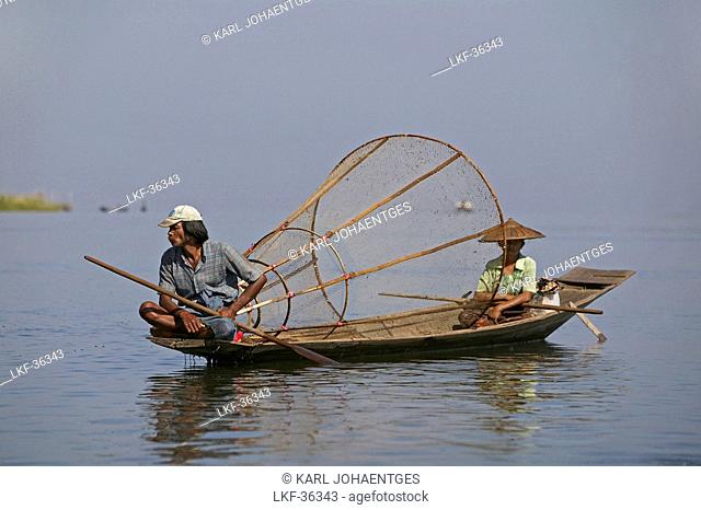 Fisherman with wife, Inle Lake, Myanmar