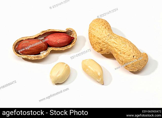 Dried peanuts isolated on white background. Arachis hypogaea