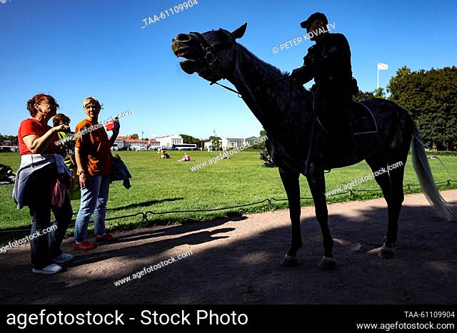 RUSSIA, ST PETERSBURG - AUGUST 15, 2023: A mounted police officer of the Russian Interior Ministry's patrol-guard service is seen in Senate Square