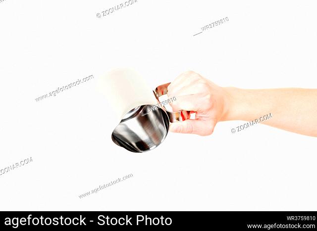 Stainless Steel Milk Boiler Jug in hand isolated on white background