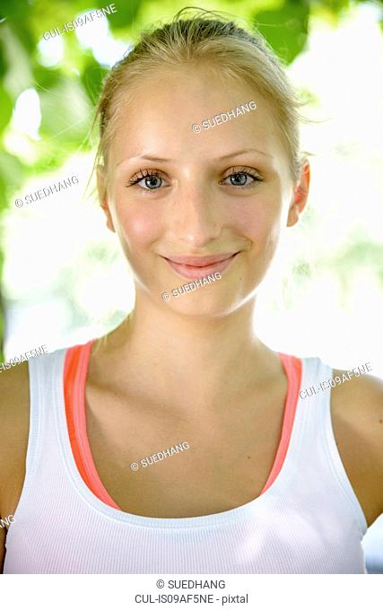 Close up portrait of female basketball player in park