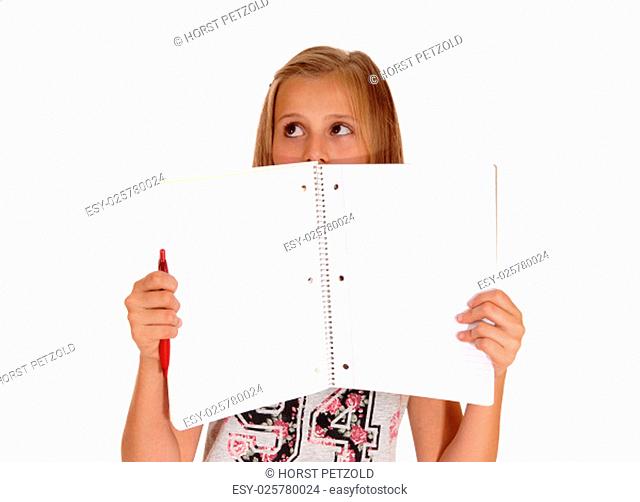 A schoolgirl holding her blank folder for her face, looking scared, .isolated for white background.