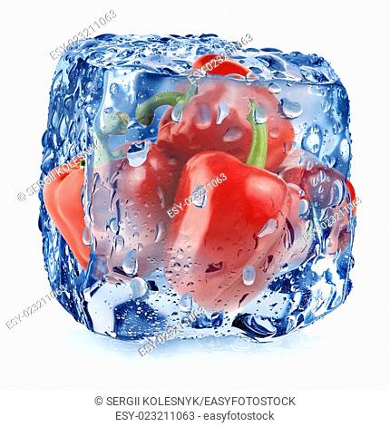 Red pepper in ice cube with drops isolated on white