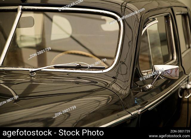 Retro car driver seat view in car museum