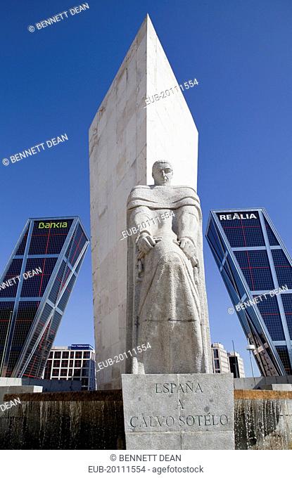 Puerta de Europa with the monument to Calvo Sotelo in the foreground at Plaza de Castilla