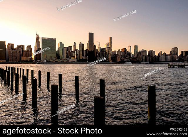 Queens NY - USA - Aug 29 2019: Long Island City Gantry sign and Manhattan midtwon skyline in front of east river