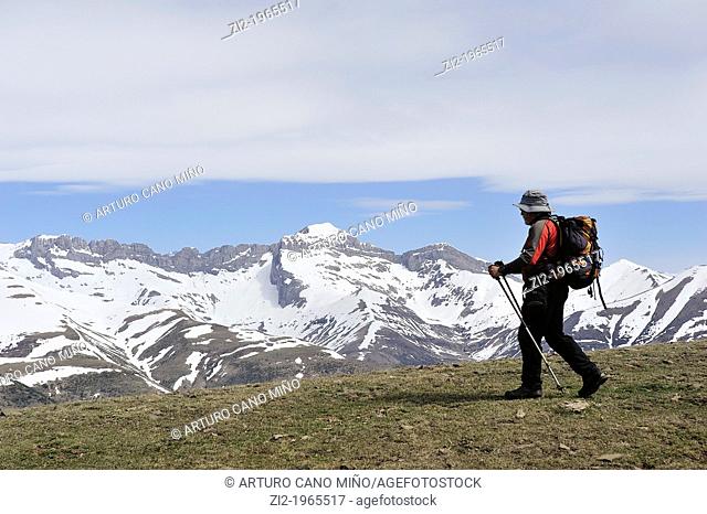 Hiker in Sierra Tendeñera. Aragonese Pyrenees. Huesca, Spain
