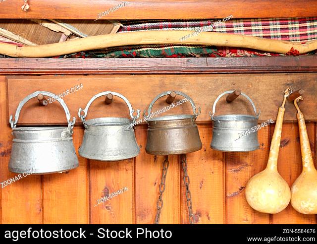 Traditional Bulgarian utensils a located wooden wall