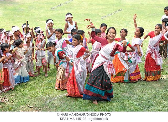Assami young girls and boys celebrating Bihu festival ; Assam ; India NO MR