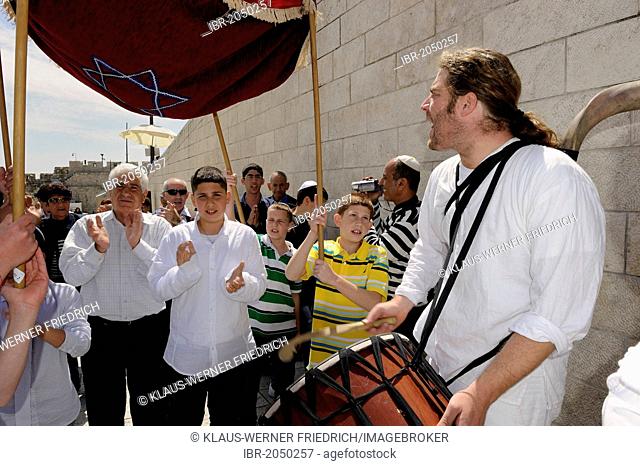 Bar Mitzvah celebration, boy, parents and guests are led to the Western or Wailing Wall to the sound of music, Muslim Quarter, Old City, Jerusalem, Israel