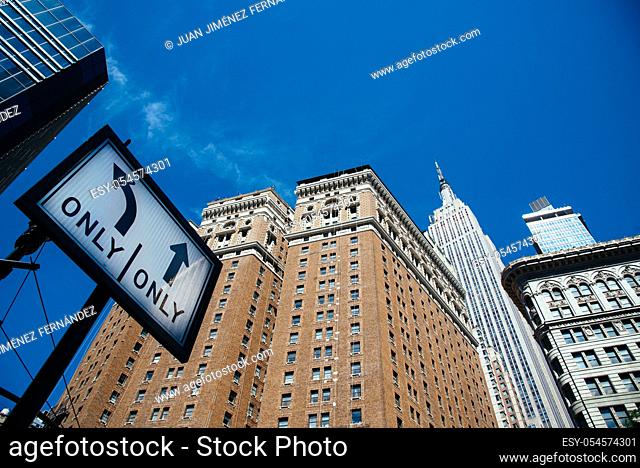 Low angle view of buildings against sky in Midtown of Manhattan in New York