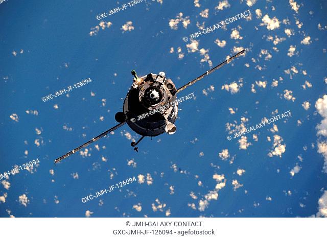 The Soyuz TMA-20 spacecraft approaches the International Space Station, carrying Russian cosmonaut Dmitry Kondratyev, Soyuz commander and Expedition 26 flight...