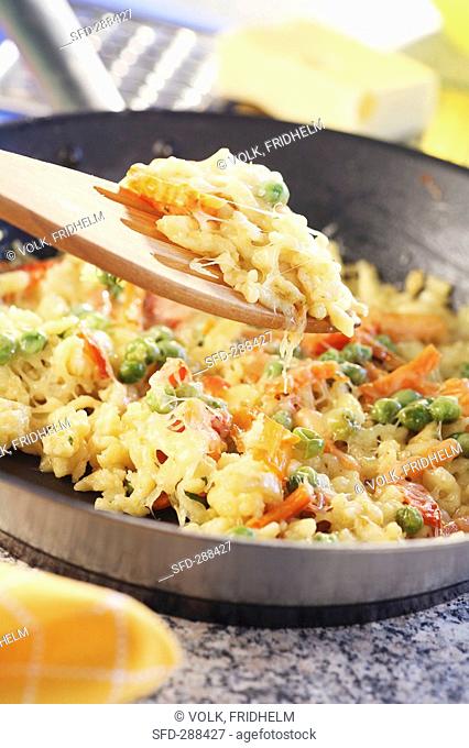 Spaetzle noodles with vegetables and cheese
