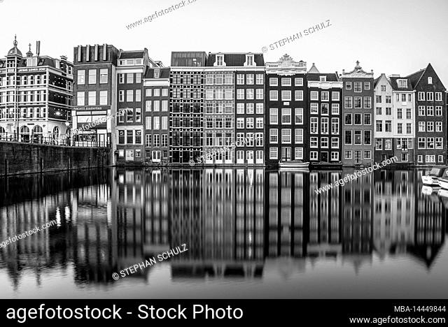 Characteristic houses, Damrak canal, Amsterdam, Netherlands